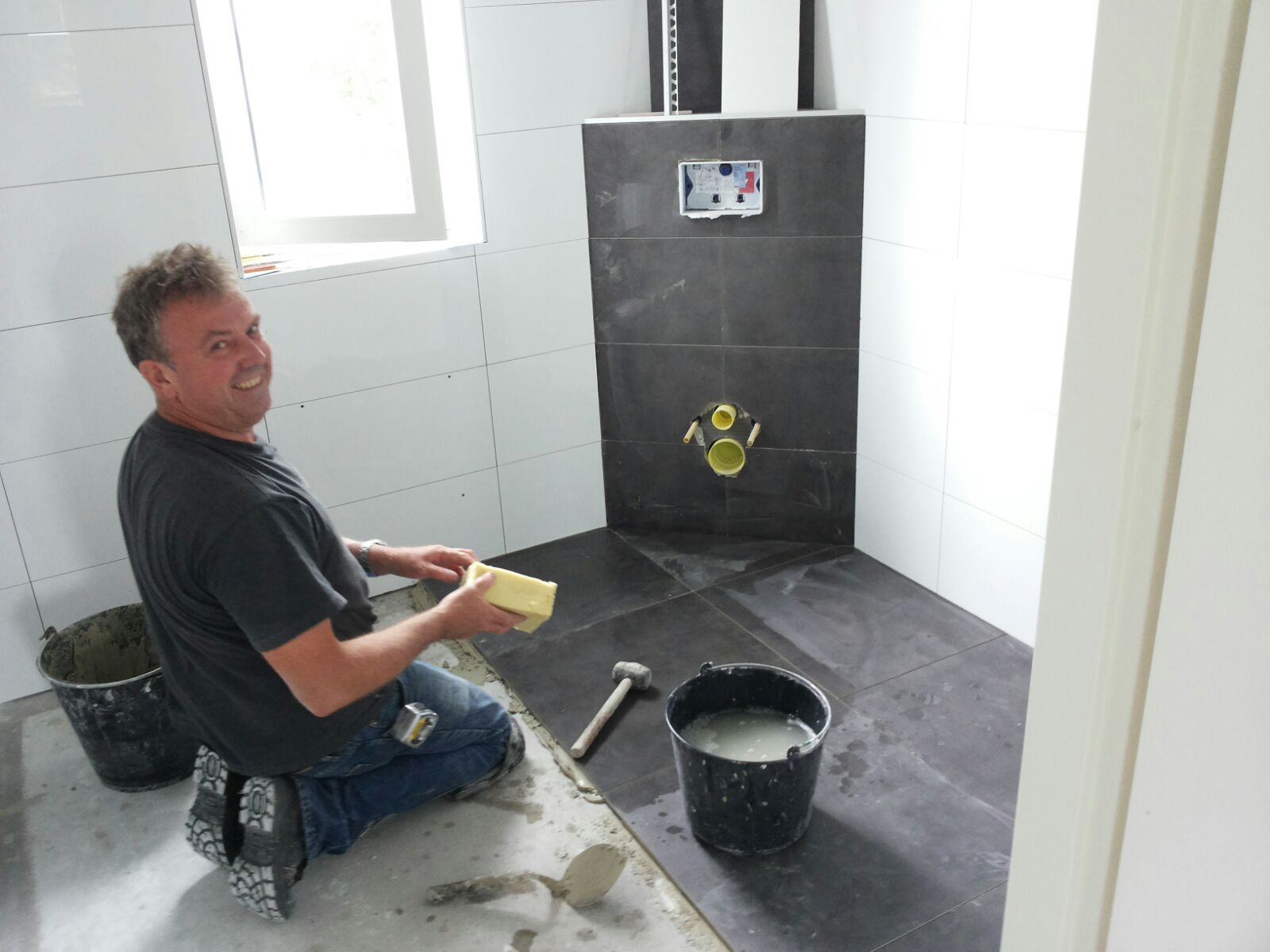 Betegeling badkamer
